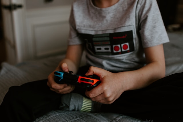 kid playing video games